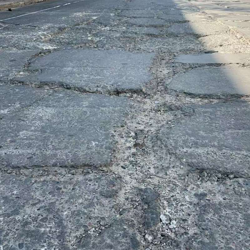 大理路面起砂露石子修补料